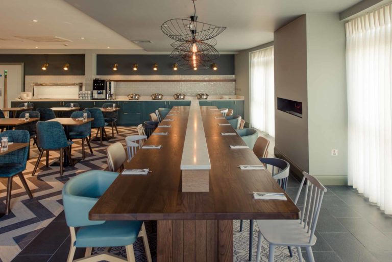 The Hoban Hotel Kilkenny refectory table in bright spacious 1801 Bar & Restaurant