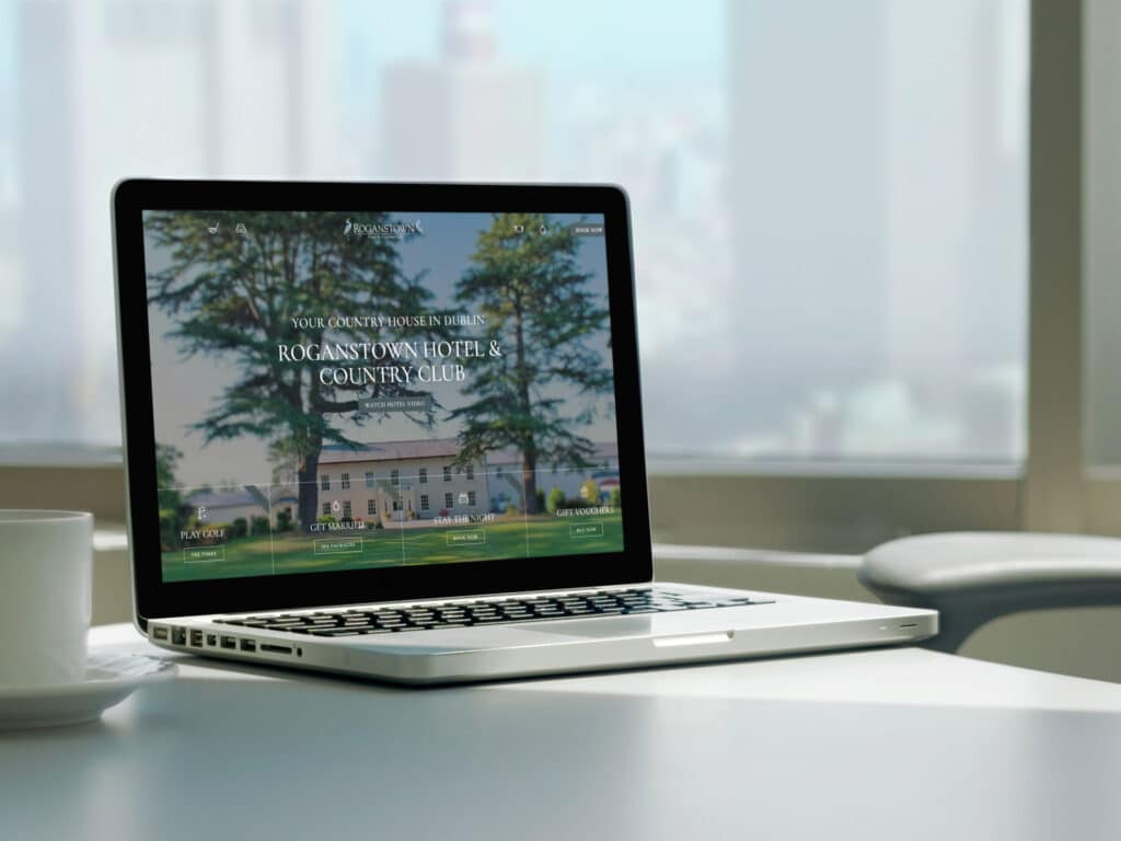 Laptop displaying Roganstown hotel website