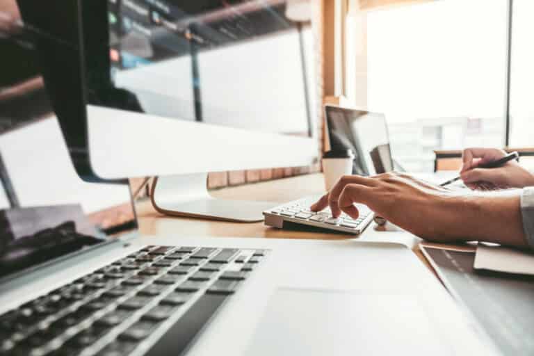 Man on computer typing